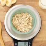 Basics Digital Kitchen Scale with LCD Display, Batteries Included, Weighs up to 11 pounds, Black and Stainless Steel